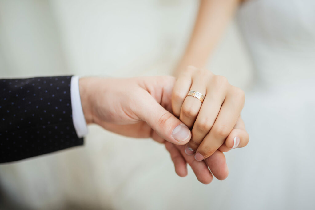 wedding moments. newly wed couple's hands with wedding rings wedding moments. newly wed couple's hands with wedding rings